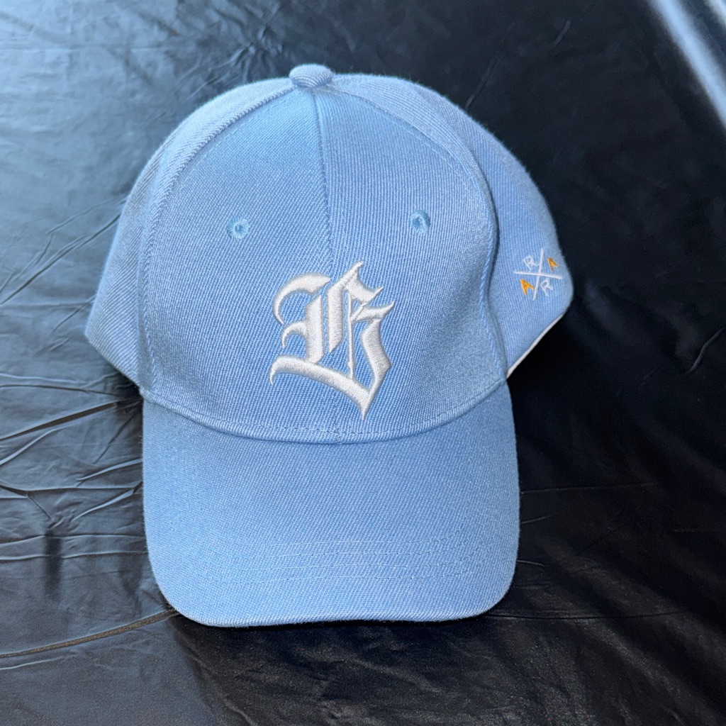 Blue Baseball Cap With White Logo
